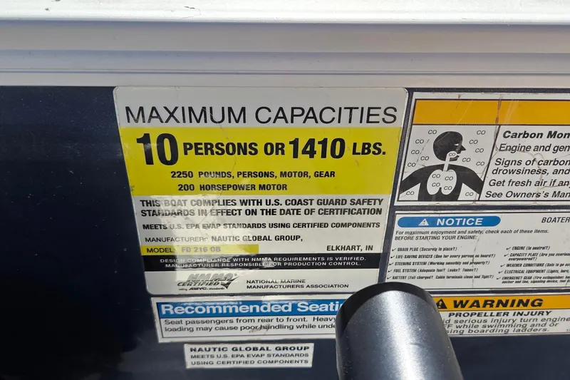 Slide: The Image of 2014 Hurricane FunDeck 216 OB capacity label: 10 persons or 1410 lbs, 200 horsepower motor. - 8