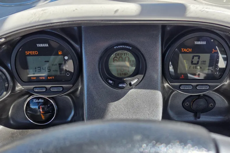 Slide: The Image of Dashboard of a 2014 Hurricane FunDeck 216 OB boat with Yamaha gauges. - 9