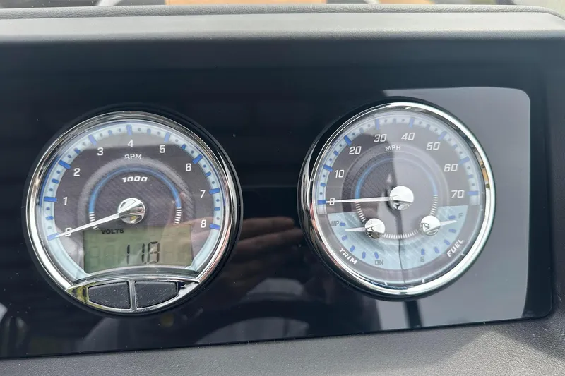 Slide: The Image of 2025 Tahoe 2785 dashboard with RPM and speedometer gauges. - 11
