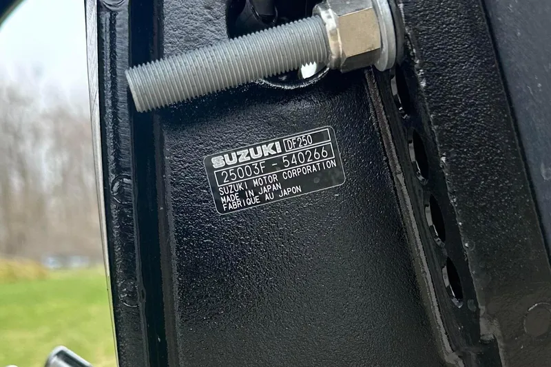 Slide: The Image of Close-up of Suzuki motor label on black metal surface, Tahoe 2785, 2025 model. - 28