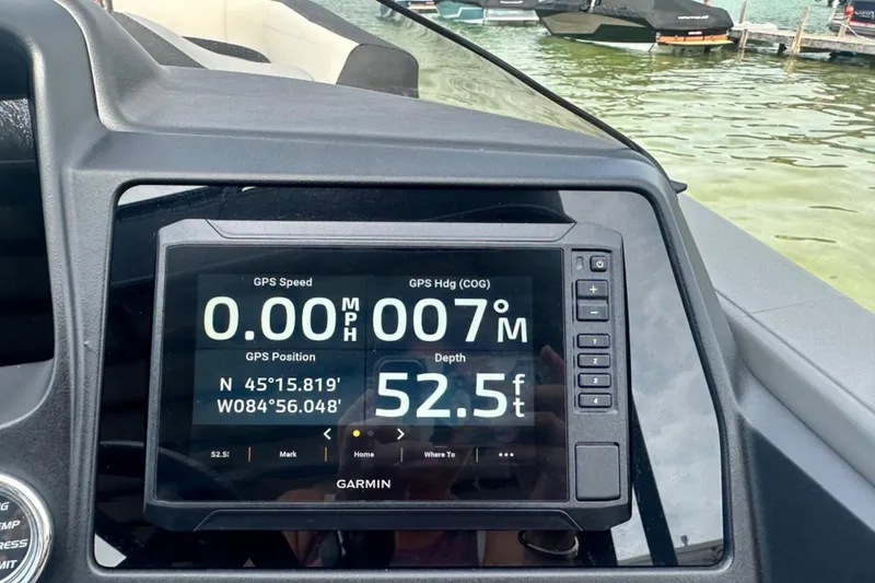 Slide: The Image of Dashboard of 2025 Tahoe 2785 boat showing GPS speed, heading, and depth. - 14