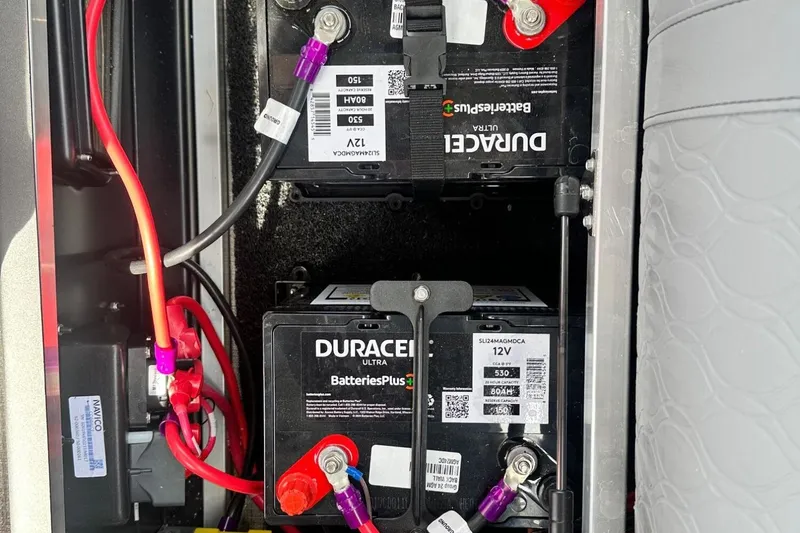 Slide: The Image of Dual Duracell Ultra batteries in a 2025 Tahoe 2785, connected with red and black cables. - 5