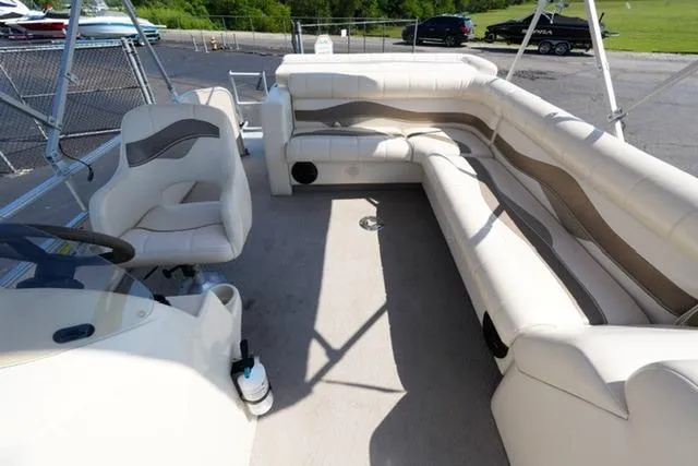 Slide: The Image of 2007 Godfrey 200 Sweetwater pontoon boat with spacious seating and modern design. - 12