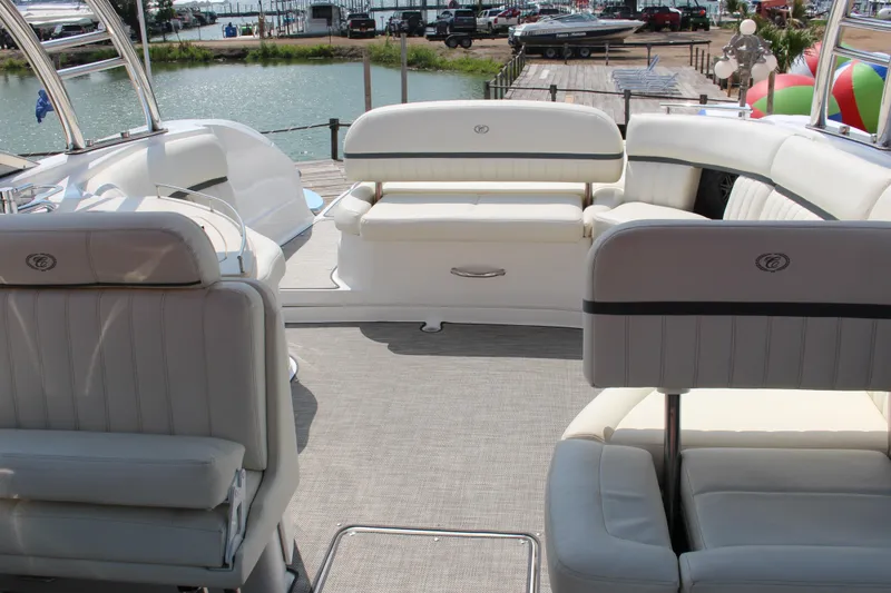 Slide: The Image of Luxurious interior of 2018 Cobalt R35 Surf boat with plush seating and waterfront view. - 10