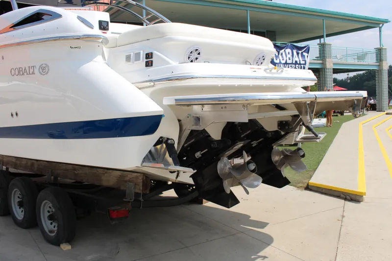 Slide: The Image of 2018 Cobalt R35 boat on trailer, showcasing dual propellers and sleek design. - 13