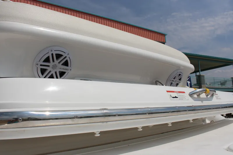 Slide: The Image of 2018 Cobalt R35 boat with JL Audio speakers and sleek white design. - 17