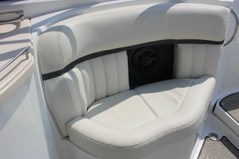 Slide: The Image of 2018 Cobalt R35 boat interior with white leather seating and speaker. - 22