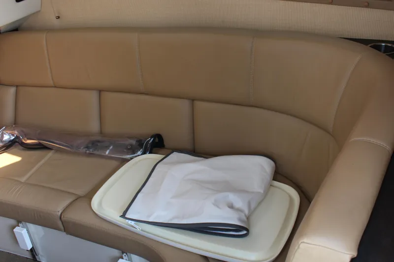 Slide: The Image of Luxurious tan leather interior of 2018 Cobalt R35 with folded tray table. - 40