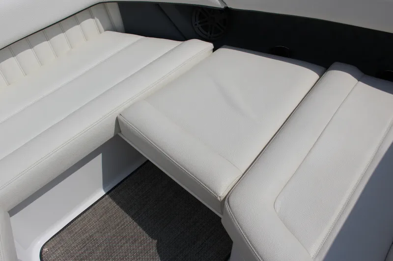 Slide: The Image of White leather seating on 2018 Cobalt R35 boat interior. - 47