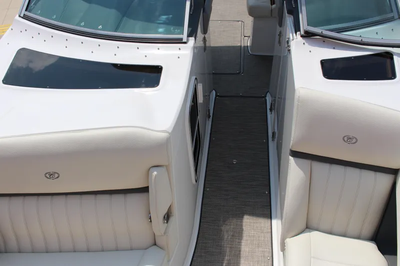 Slide: The Image of 2018 Cobalt R35 boat interior with white leather seats and sleek design. - 53