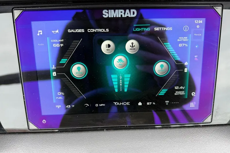 Slide: The Image of Touchscreen display of a 2025 Tahoe 2785 boat showing gauges and settings. - 15