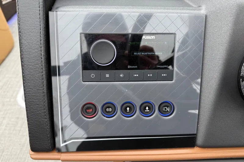 Slide: The Image of Control panel of a 2025 Tahoe 2785 with Bluetooth and media buttons. - 16