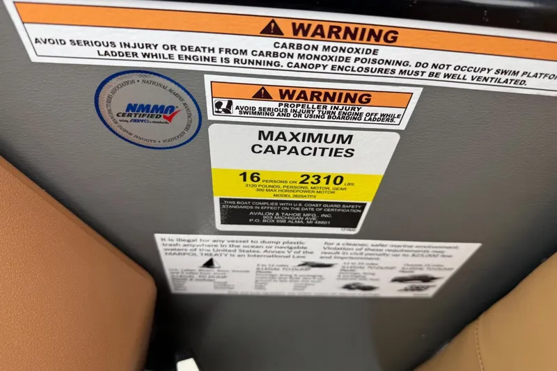 Slide: The Image of Warning labels and capacity information on Tahoe 2785, 2025 model boat. - 19