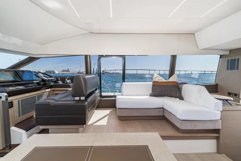 Slide: The Image of Luxurious interior of 2019 Prestige 520 yacht with modern seating and ocean view. - 10