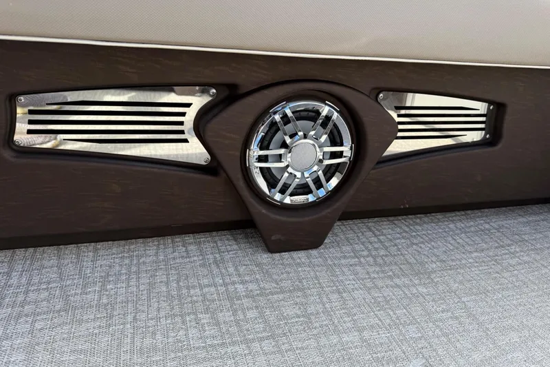 Slide: The Image of Speaker and grille detail on 2025 Tahoe 2585 boat interior. - 14