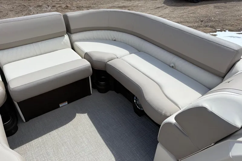 Slide: The Image of Luxurious seating on 2025 Tahoe 2585 boat, featuring plush beige upholstery. - 19