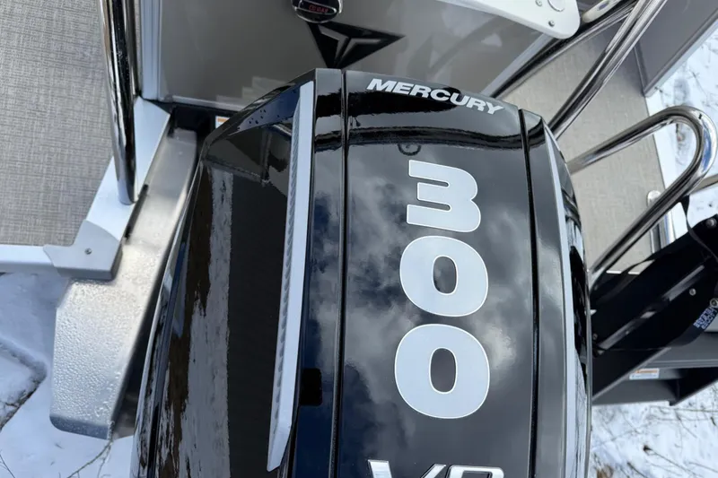 Slide: The Image of Mercury 300 HP engine on 2025 Tahoe 2585 boat, close-up view. - 5