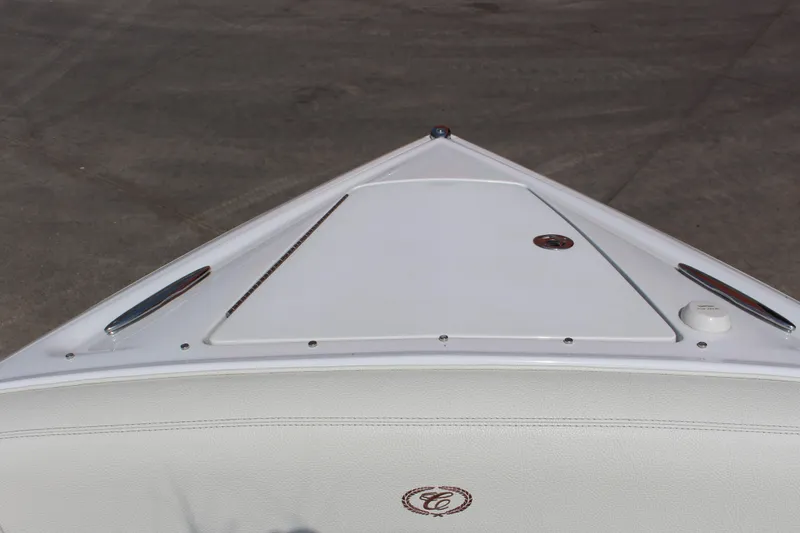 Slide: The Image of Bow of 2017 Cobalt R35 boat with sleek white design and chrome accents. - 26