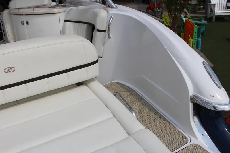 Slide: The Image of 2017 Cobalt R35 boat interior with white leather seating and sleek design. - 49