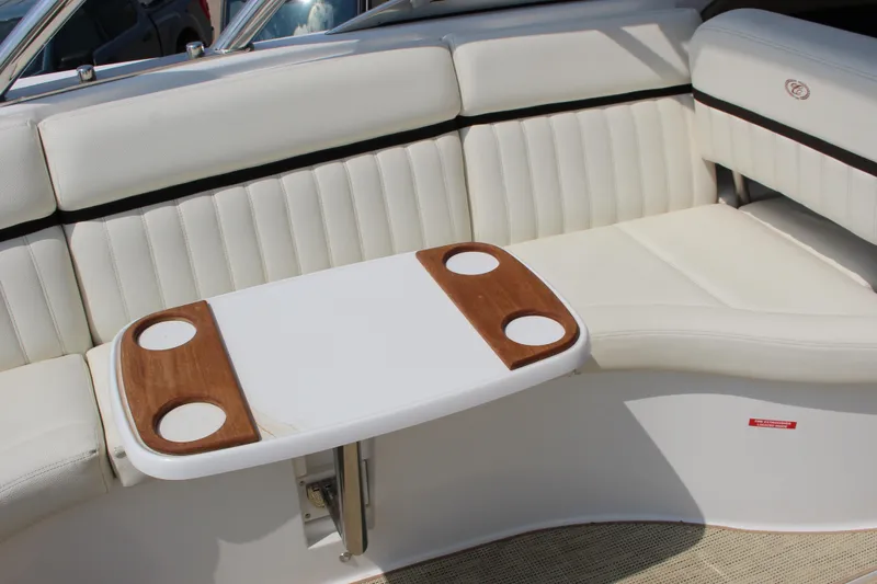 Slide: The Image of Luxurious seating area on a 2017 Cobalt R35 boat with a stylish table. - 55