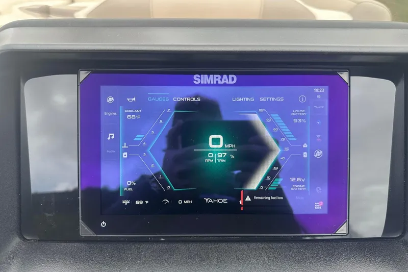 Slide: The Image of 2025 Tahoe 2585 dashboard display showing speed, fuel, and battery status. - 17
