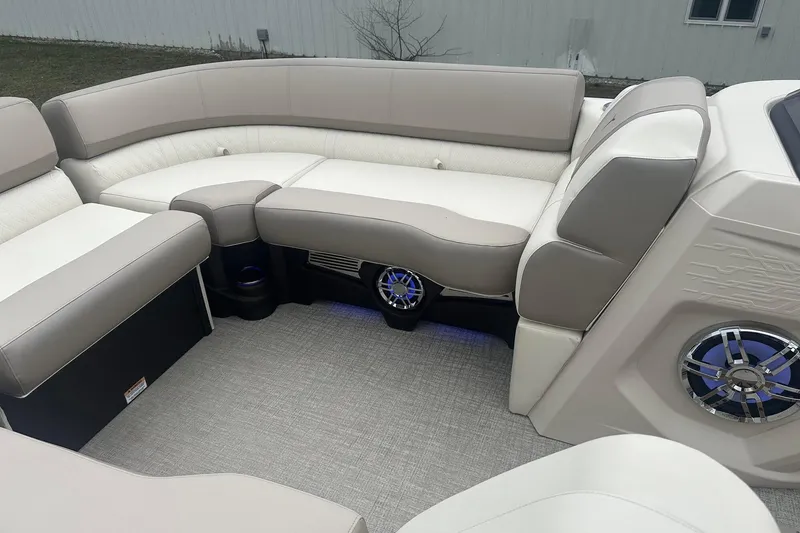 Slide: The Image of Luxurious seating in 2025 Tahoe 2585 boat with modern design and built-in speakers. - 21