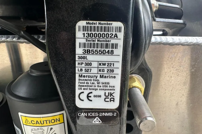 Slide: The Image of Label on Mercury Marine engine, model 300L, with specifications and caution sign. - 26