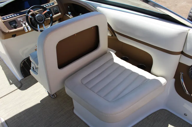 Slide: The Image of Interior of 2016 Cobalt R30 boat featuring luxurious seating and modern dashboard design. - 5