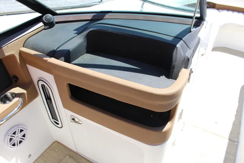 Slide: The Image of 2016 Cobalt R30 boat interior with seating and storage compartment. - 6