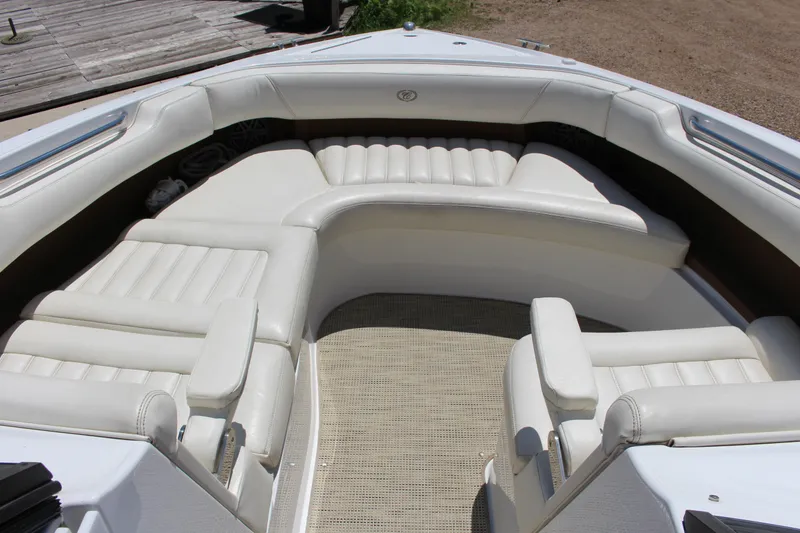 Slide: The Image of Luxurious seating area on a 2016 Cobalt R30 boat with white upholstery. - 7