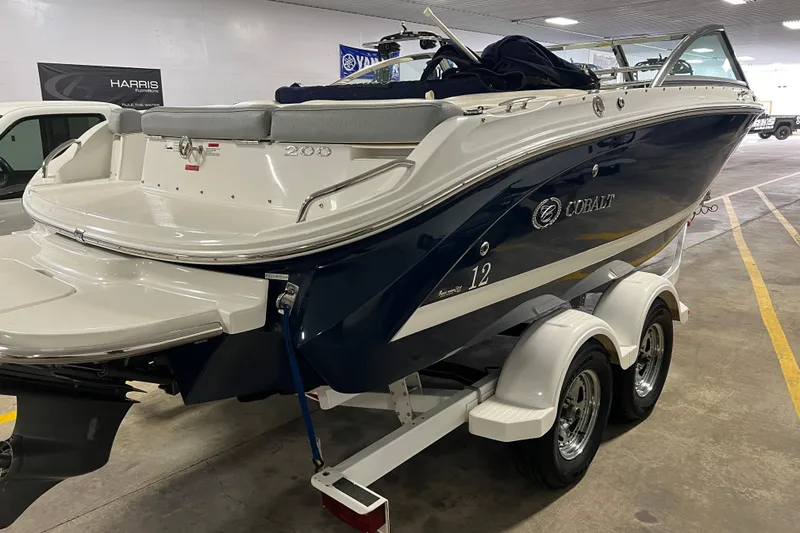 The Image of 2015 Cobalt 200 boat on trailer in indoor storage facility. - 1