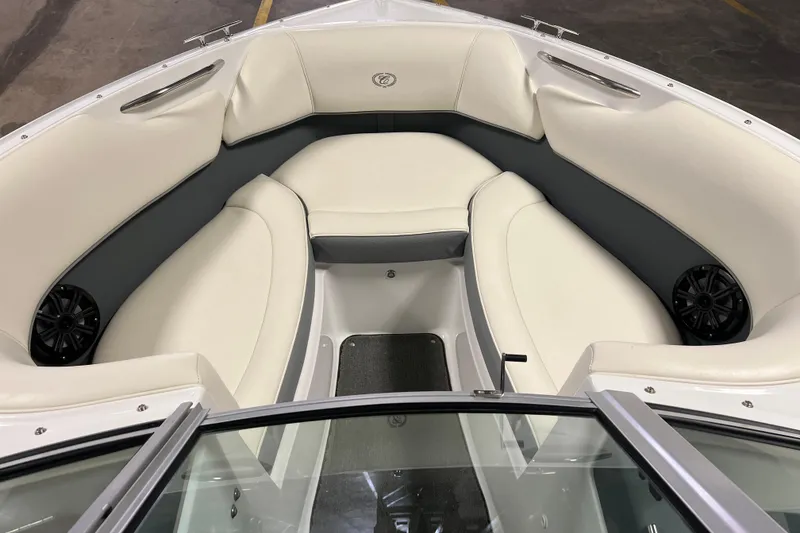 Slide: The Image of Interior of a 2015 Cobalt 200 boat with white and gray seating. - 5