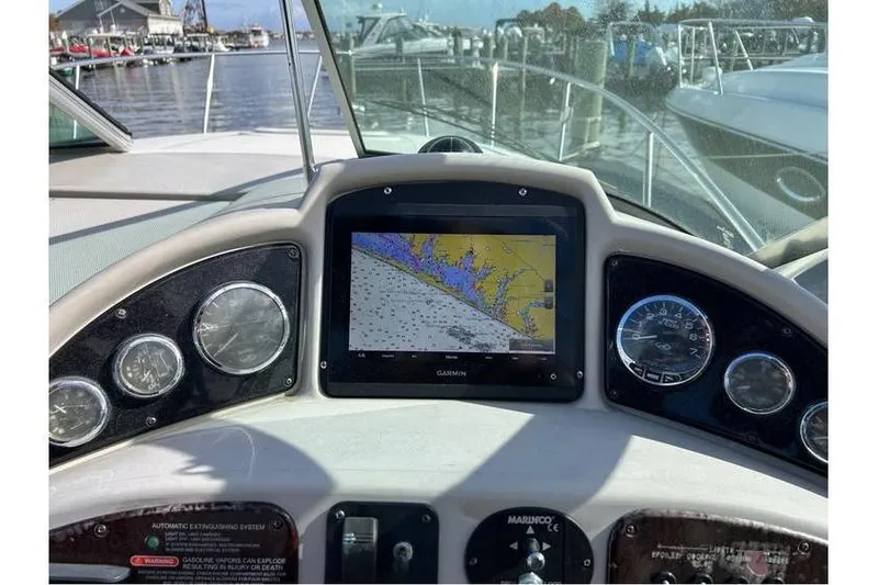 Slide: The Image of Dashboard of a 2007 Sea Ray 270 Amberjack with Garmin navigation display. - 8