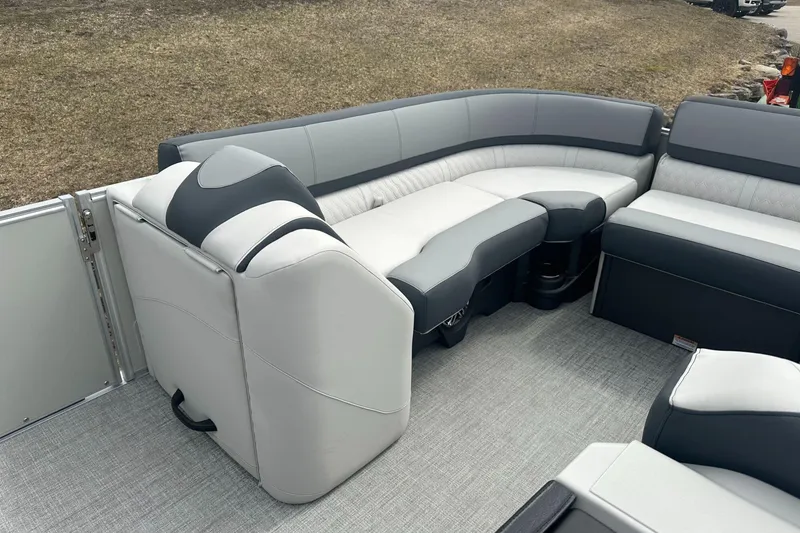 Slide: The Image of 2025 Tahoe 2585 boat interior with sleek gray seating and modern design. - 10