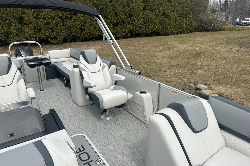 Slide: The Image of 2025 Tahoe 2585 pontoon boat interior with luxurious seating and modern design. - 8