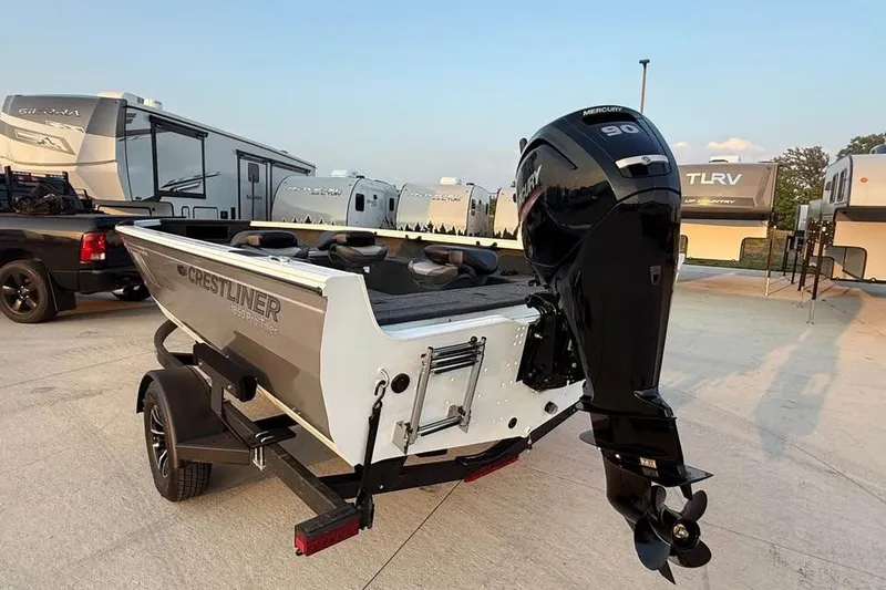 Slide: The Image of 2026 Crestliner 1850 Pro Tiller boat with Mercury 90 engine on trailer. - 5