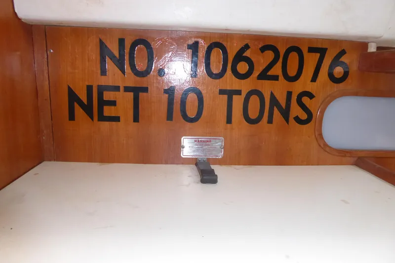 Slide: The Image of Catalina 36 MkII 1998 boat interior with registration number and net tonnage displayed. - 25