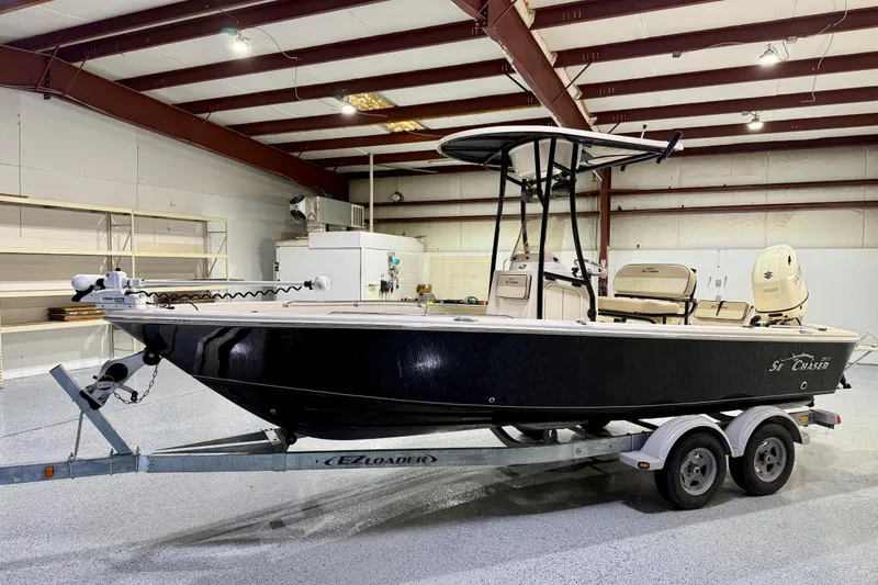Slide: The Image of 2020 Sea Chaser 23 LX boat on trailer in indoor storage facility. - 10