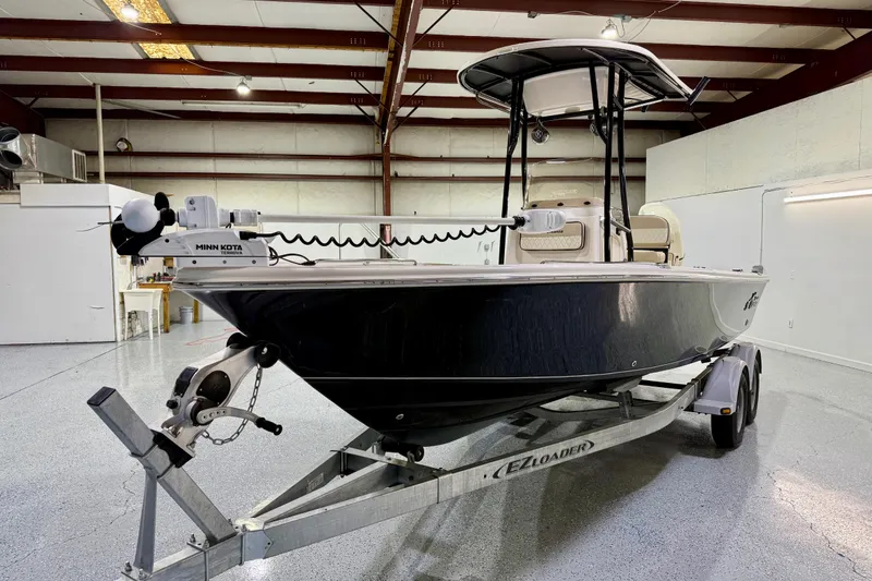 Slide: The Image of 2020 Sea Chaser 23 LX boat on trailer in indoor storage facility. - 11