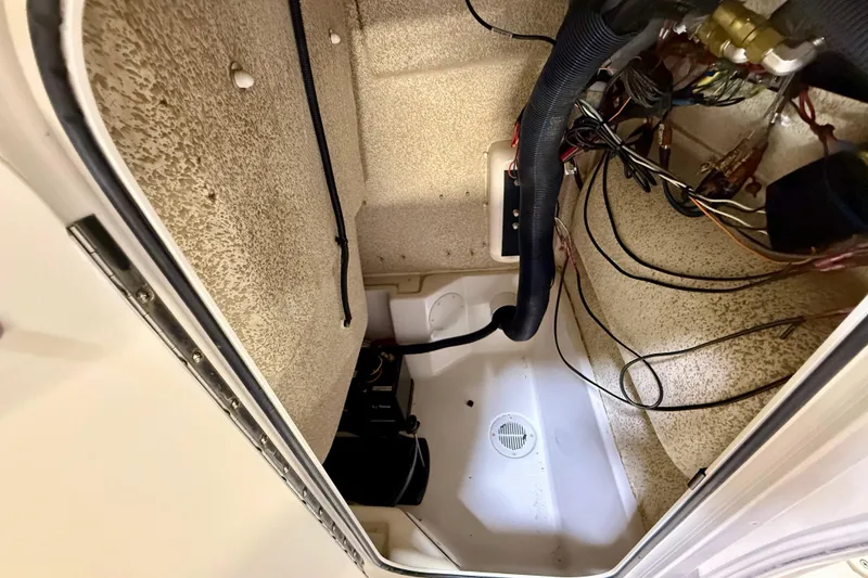 Slide: The Image of 2020 Sea Chaser 23 LX boat interior wiring and compartment view. - 33