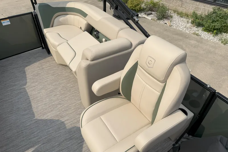Slide: The Image of Luxurious seating on 2026 Godfrey SW 2286 SB pontoon boat, featuring beige upholstery. - 11