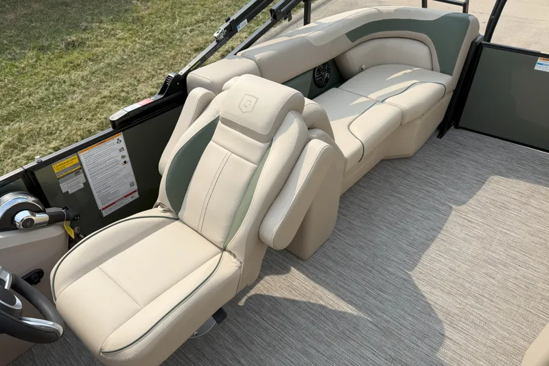Slide: The Image of Luxurious seating on 2026 Godfrey SW 2286 SB boat, featuring beige upholstery and modern design. - 9