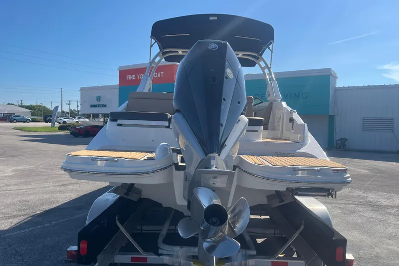 Slide: The Image of 2024 Sea Ray SDX 270 Outboard boat on trailer, rear view, sunny day. - 4