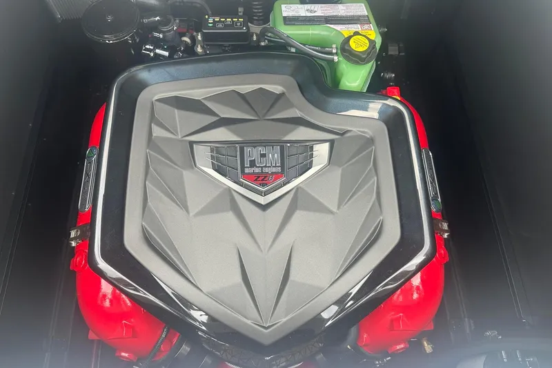 Slide: The Image of 2025 Nautique G23 PCM marine engine with red and gray components. - 17