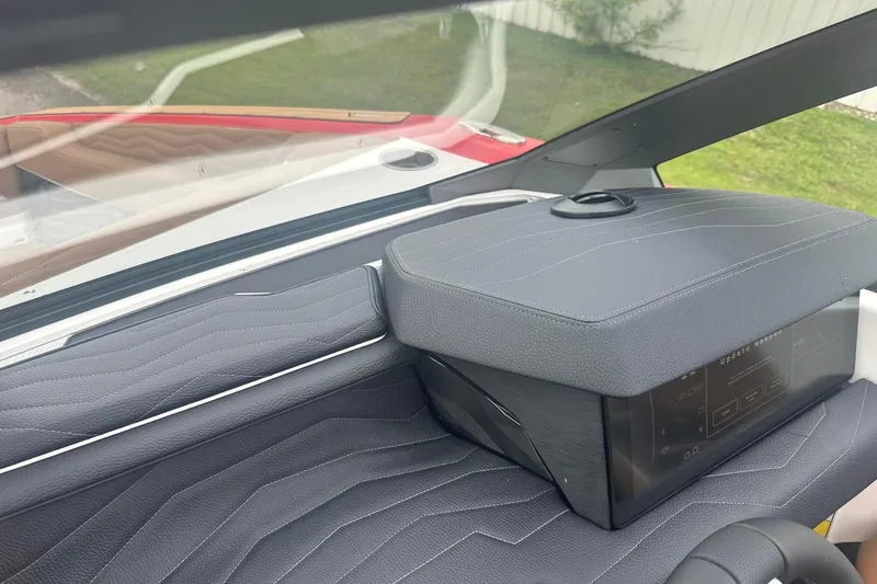 Slide: The Image of 2025 Nautique G23 dashboard with sleek design and advanced controls. - 31