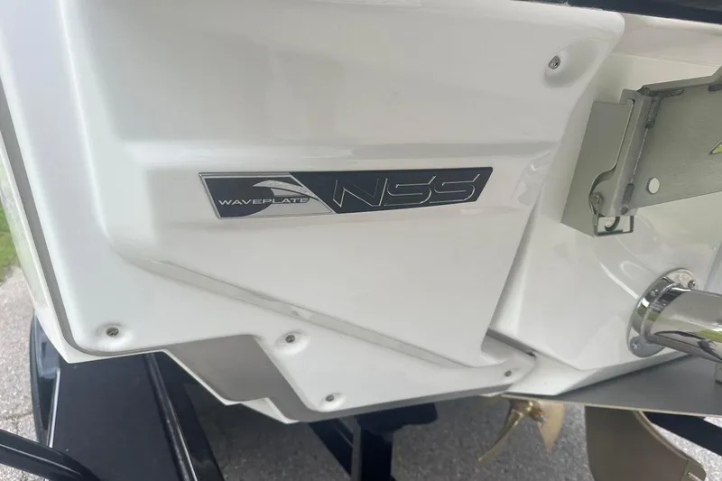 Slide: The Image of 2025 Nautique G23 boat with NSS Waveplate detail. - 6