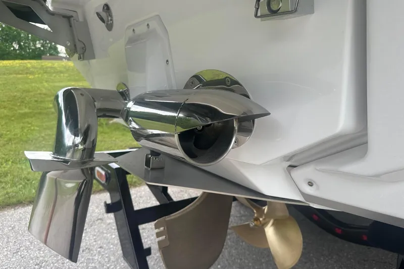 Slide: The Image of 2025 Nautique G23 boat exhaust and propeller detail, showcasing sleek design and engineering. - 7