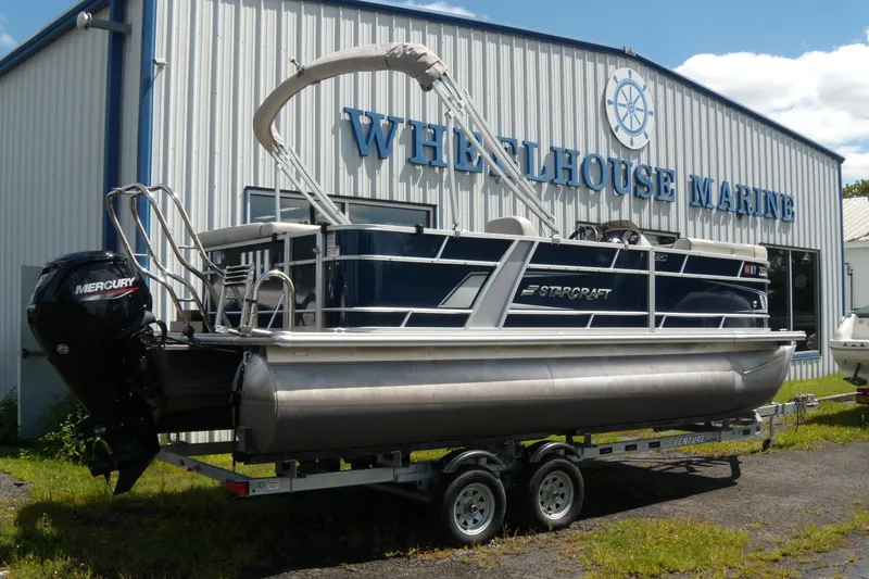 Slide: The Image of 2020 Starcraft EX 20 C pontoon boat at Wheelhouse Marine dealership. - 1