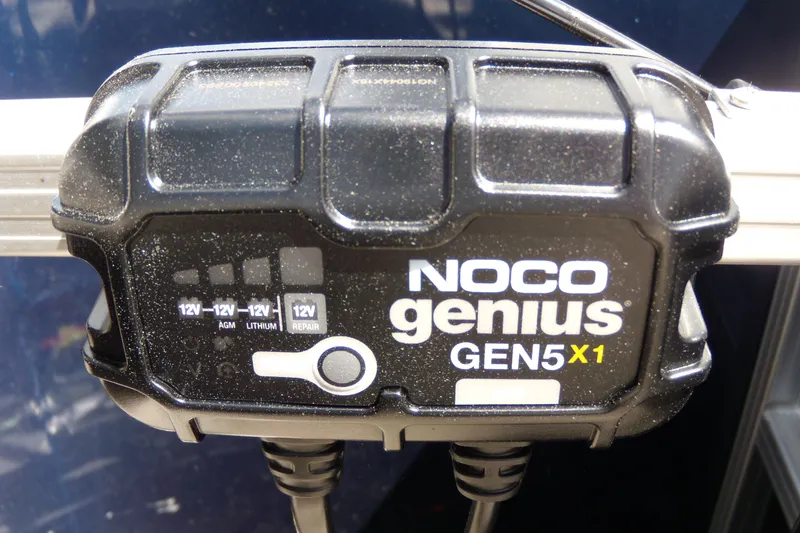 Slide: The Image of NOCO Genius GEN5X1 battery charger on a 2020 Starcraft EX 20 C boat. - 12