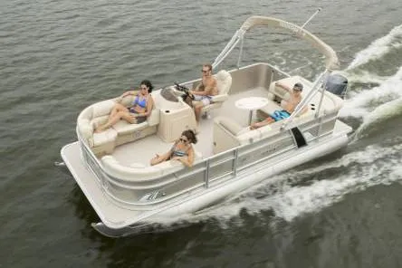 Slide: The Image of Manufacturer Provided Image: 2020 Starcraft EX 20 C pontoon boat cruising with passengers on a lake. - 28